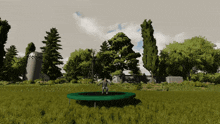 a man is jumping on a trampoline in a field