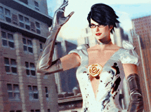 a woman in a white dress and silver gloves is standing in front of a building