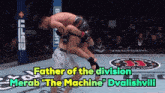 two men are wrestling in a ring with the words father of the division merab the machine dvalishvili