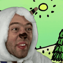 a man in a polar bear costume is smiling in front of a drawing of the sun