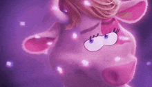 a close up of a cartoon cow 's face with glowing eyes .