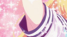 a close up of a girl 's arm with sparkles surrounding it
