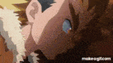 a close up of a person 's face with a furry jacket on a gif .