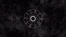 a black and white drawing of a circle with the roman numerals vii viii and ix