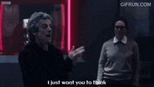 a man says i just want you to think while standing next to another man