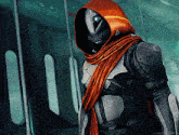 a person with a scarf around their neck is wearing a hood