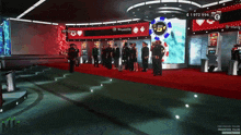 a group of people are standing in front of a screen that says ' kings ' on it