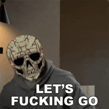 a person with a skull on their head and the words let 's fucking go