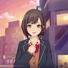 a girl in a school uniform is standing in front of a building