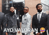 a group of men in suits and ties standing next to each other with the caption ayo valoran above them