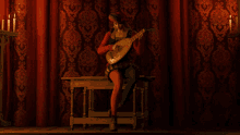 playing mandriola priscilla the witcher playing music performing