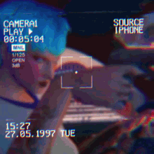 a video of a person taking a picture with the words source iphone on the bottom right