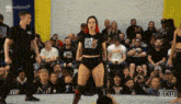 a woman in a black shirt that says new york on it