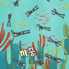 a group of scuba divers are swimming in the ocean with a sticker that says ' ' on it