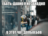 a blurry picture of people walking down a street with a sign that says singer