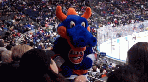 New York Islanders mascot Sparky celebrates the victory over the