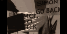 Simon Go GIF - Simon Go Back GIFs