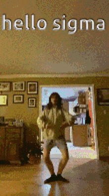 a man is dancing in a living room with the words hello sigma behind him