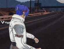 a man with blue hair is standing in front of a red light that says viggles on it