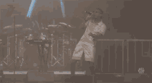 Pointing On Stage GIF - Pointing On Stage Performing GIFs