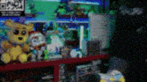 a bunch of stuffed animals are sitting on a shelf in a dark room .