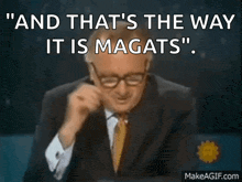 a man in a suit and tie is clapping with the words " and that 's the way it is magats "
