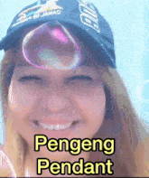 a woman wearing a blue hat has a bubble on her forehead and the words pengeng pendant below her