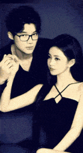 a man and a woman are posing for a picture together