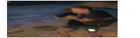 a blurry picture of a person standing on a grassy field .