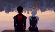a man and a woman are sitting next to each other on a bench