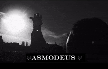 a black and white photo of a person with the word nasmodeus on the bottom right