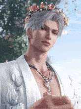 a man with a flower crown on his head and a necklace