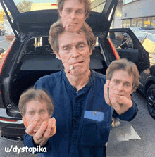 a man is smoking a cigarette in front of a car with the username dystopia on the bottom