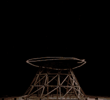 a wooden structure with a red circle around it