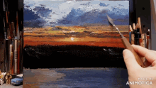 a person is painting a sunset on a canvas that is made in animatica
