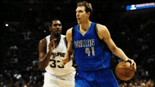 a basketball player wearing a dallas jersey is dribbling the ball