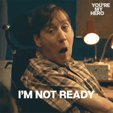 a man in a wheelchair says " i 'm not ready " in front of a lamp