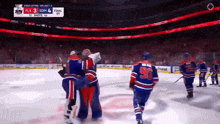 a hockey player with the number 96 on his jersey stands on the ice