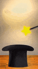 a black top hat with a magic wand coming out of it