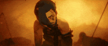 a person with a mask on their face is looking at the camera