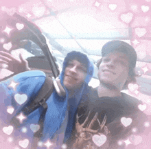two young men are posing for a picture in a car with hearts around them