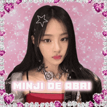 a picture of minji de abri with a pink background