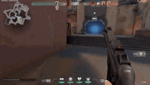 a person is holding a gun in a video game with a time of 1:00