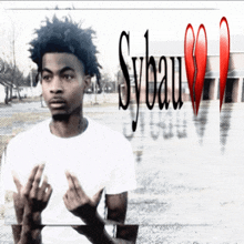 a young man giving the middle finger with sybau written in red