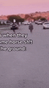 a man is running down a street with the words when they come horse sh t the ground .