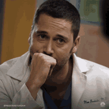 a close up of a man 's face with the words #newamsterdam on the bottom
