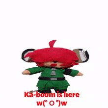 a stuffed animal with the words ka-boom is here w ( o ) w below it