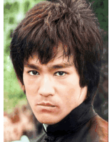 a close up of a person 's face with a serious look on his face
