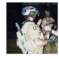 a man in a military uniform is talking to another man with the caption yeah clipped you didn t advert raid