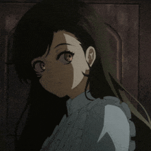 a close up of a girl with long hair